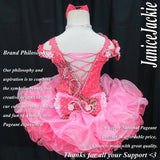 (#327) Off shoulder flat glitz pageant dress. (coral and pink) (not inclede necklace)