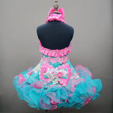 (DRESS EXAMPLE) Halter flared mega glitz national pageant dress. (teal green with flamingo pink) (item: OnlyOne-029)