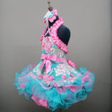 (DRESS EXAMPLE) Halter flared mega glitz national pageant dress. (teal green with flamingo pink) (item: OnlyOne-029)