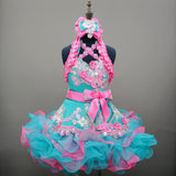 (DRESS EXAMPLE) Halter flared mega glitz national pageant dress. (teal green with flamingo pink) (item: OnlyOne-029)