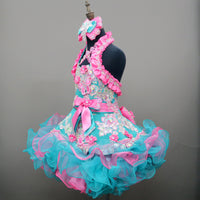 (DRESS EXAMPLE) Halter flared mega glitz national pageant dress. (teal green with flamingo pink) (item: OnlyOne-029)